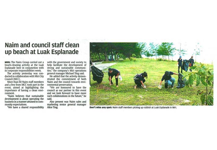 Naim and council staff clean up beach at Luak Esplanade