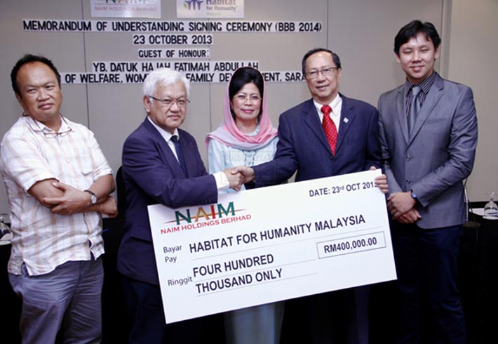 Naim signs MoU with Habitat to build houses for the poor